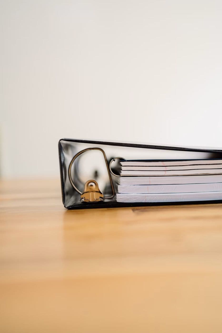 A ring binder full of documents